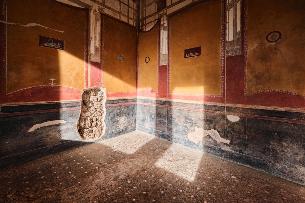 Frescoes and garden courtyard in the House of the Vettii, Pompeii
